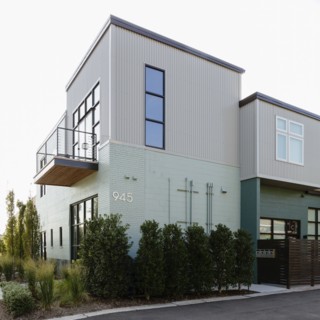 Modern condo building and parking lot