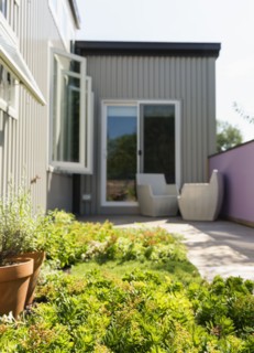 Landscaping and patio of modern condo building
