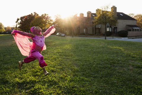 African American girl dancing in princess costume