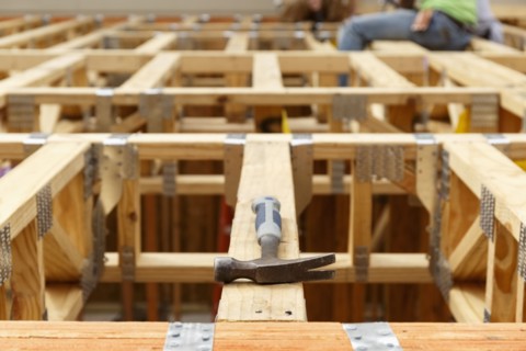 Hammer on the roof at construction site