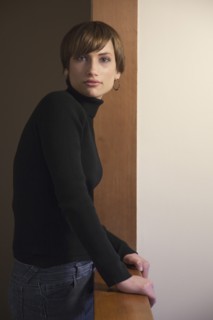 Caucasian woman standing at banister