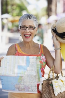 Senior woman holding a map