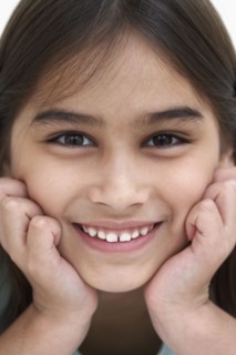 Close up of young girl smiling
