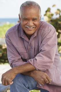 Senior man laughing outdoors