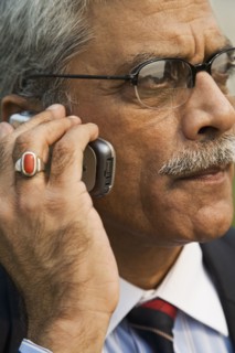 Indian businessman talking on cell phone