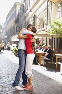 Couple hugging outdoors