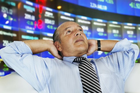 Hispanic businessman at stock exchange