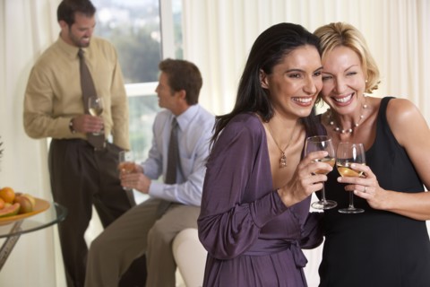 Smiling couples enjoying party