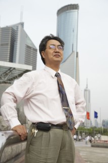 Chinese businessman standing outdoors