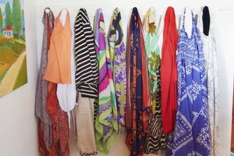 Clothes hanging on pegs