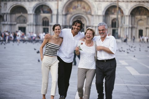 Couples walking together in St. Mark's Square