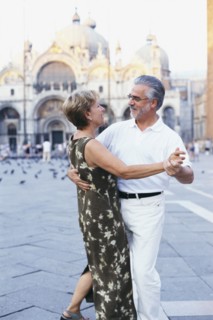 Senior couple dancing in St. Mark's Square
