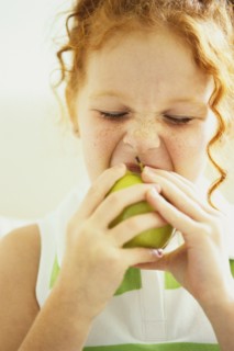 Girl eating apple