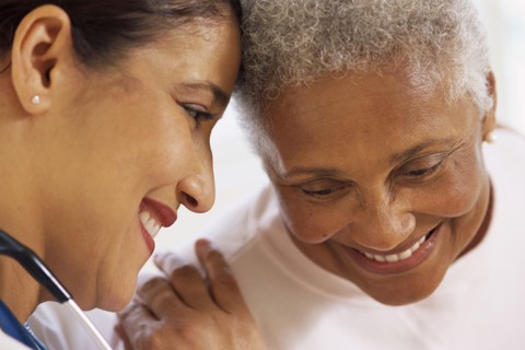 Nurse talking to Senior patient in hospital