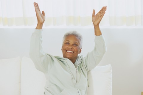 Senior woman clapping her hands