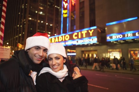 Couple smiling outside Radio City Hall