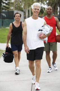 Senior men walking on court