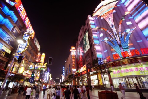 City street lit up at night
