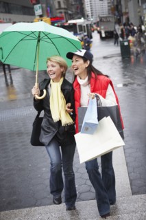 Women walking together on city street