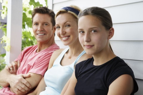 Family sitting together outdoors