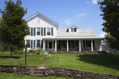 Stone wall outside suburban house