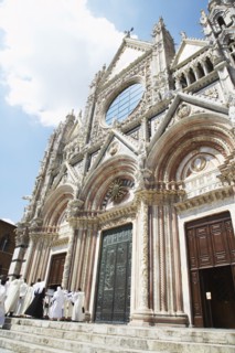 People standing outside Duomo