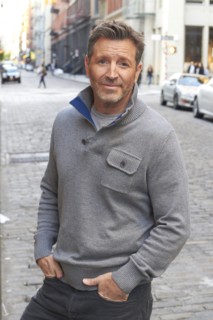 Caucasian man standing on city street
