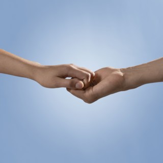 Friends holding hands
