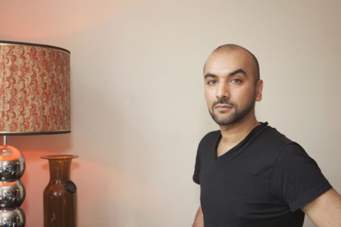 Mixed race man in living room