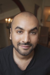 Close up of smiling mixed race man