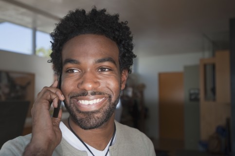 Black man talking on cell phone
