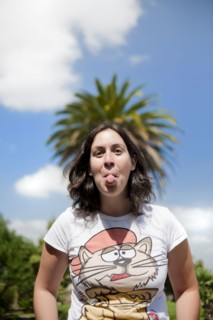 Caucasian woman sticking out tongue