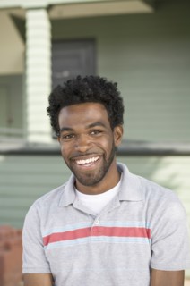 African American man smiling outdoors