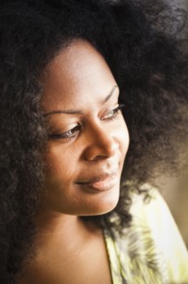 Close up of smiling mixed race woman