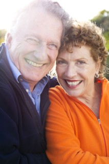 Caucasian couple smiling outdoors
