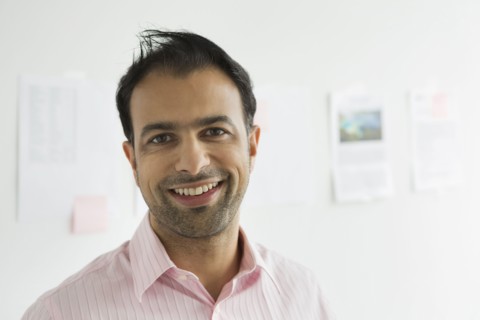Businessman smiling in office