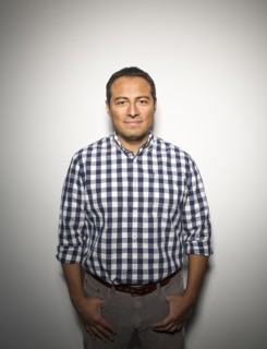 Hispanic businessman smiling