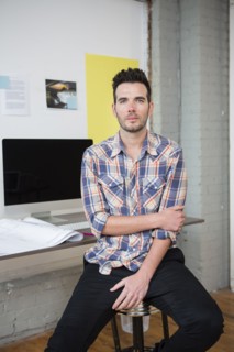 Caucasian architect sitting in office