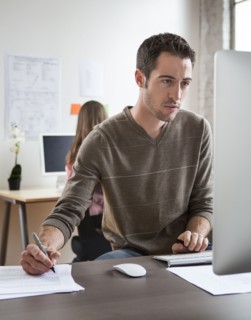 Caucasian architect working in office