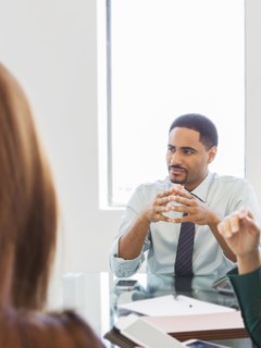 Business people listening in meeting