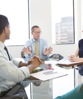 Business people talking in meeting