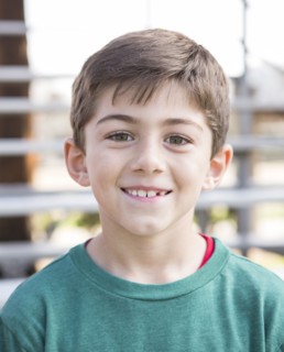 Close up of Caucasian boy smiling