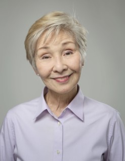 Close up of older Japanese woman smiling
