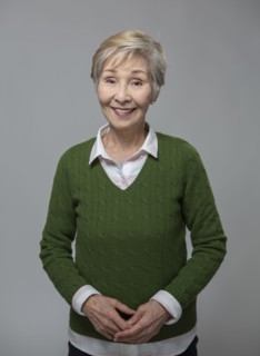 Close up of older Japanese woman smiling