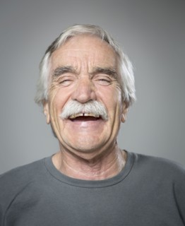 Close up of older Caucasian man laughing