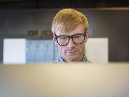 Caucasian businessman working on computer