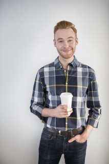 Caucasian businessman drinking coffee