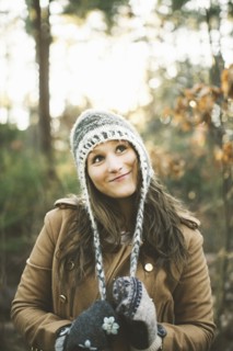 Caucasian woman wearing knitted cap in park