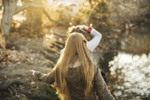 Caucasian women walking in park