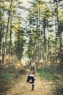 Caucasian woman standing on dirt path